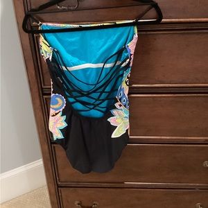 Trina Turk one piece women’s swimsuit size 12. Used condition.